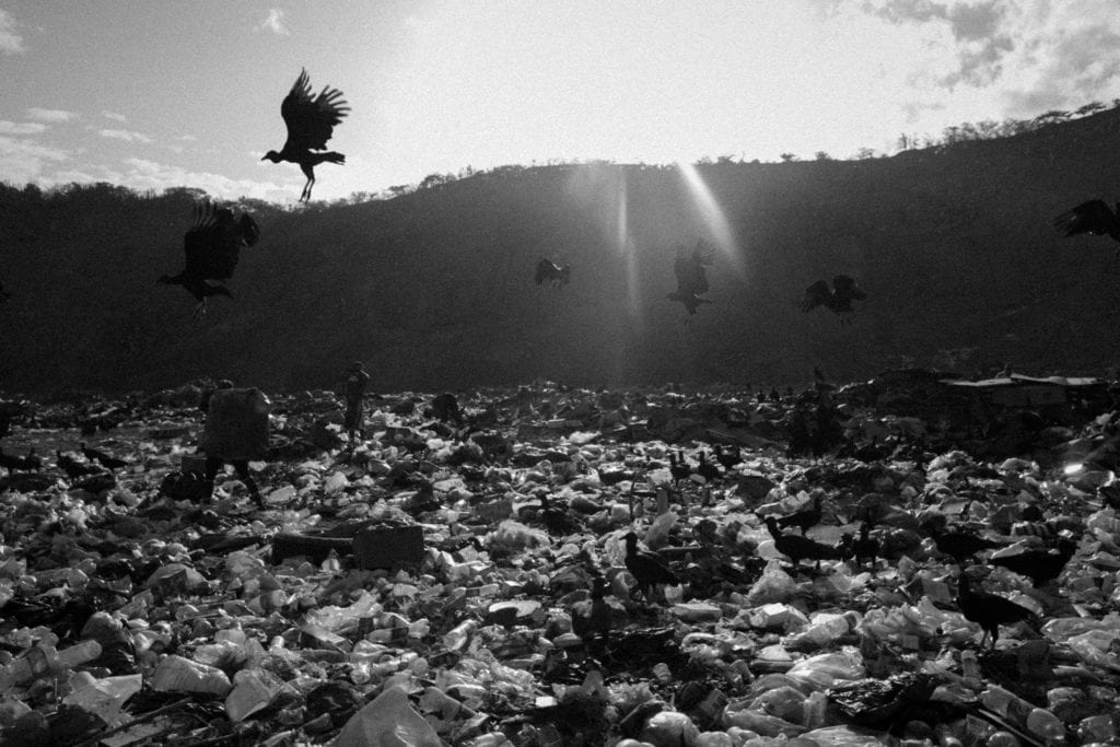 A garbage dump located in the outskirts of Caracas on July 6, 2016, where the families looking for food have increase in the past year do to the severe economic crisis and food shortage. From the series Blurred in Despair.
